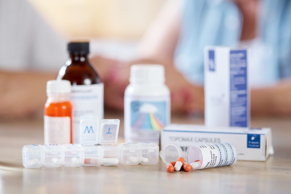 cropped-shot-of-medication-on-a-kitchen-table-with-2023-11-27-05-11-28-utc